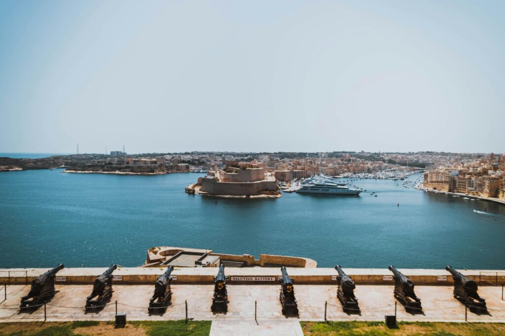 Stunning view of Valletta harbor and city from Saluting Battery on a sunny day.